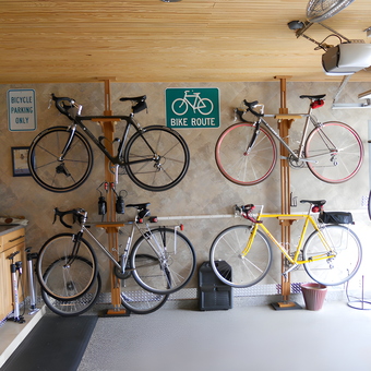 Organized garage with wall bike racks and cabinets - Richard from Spring, TX