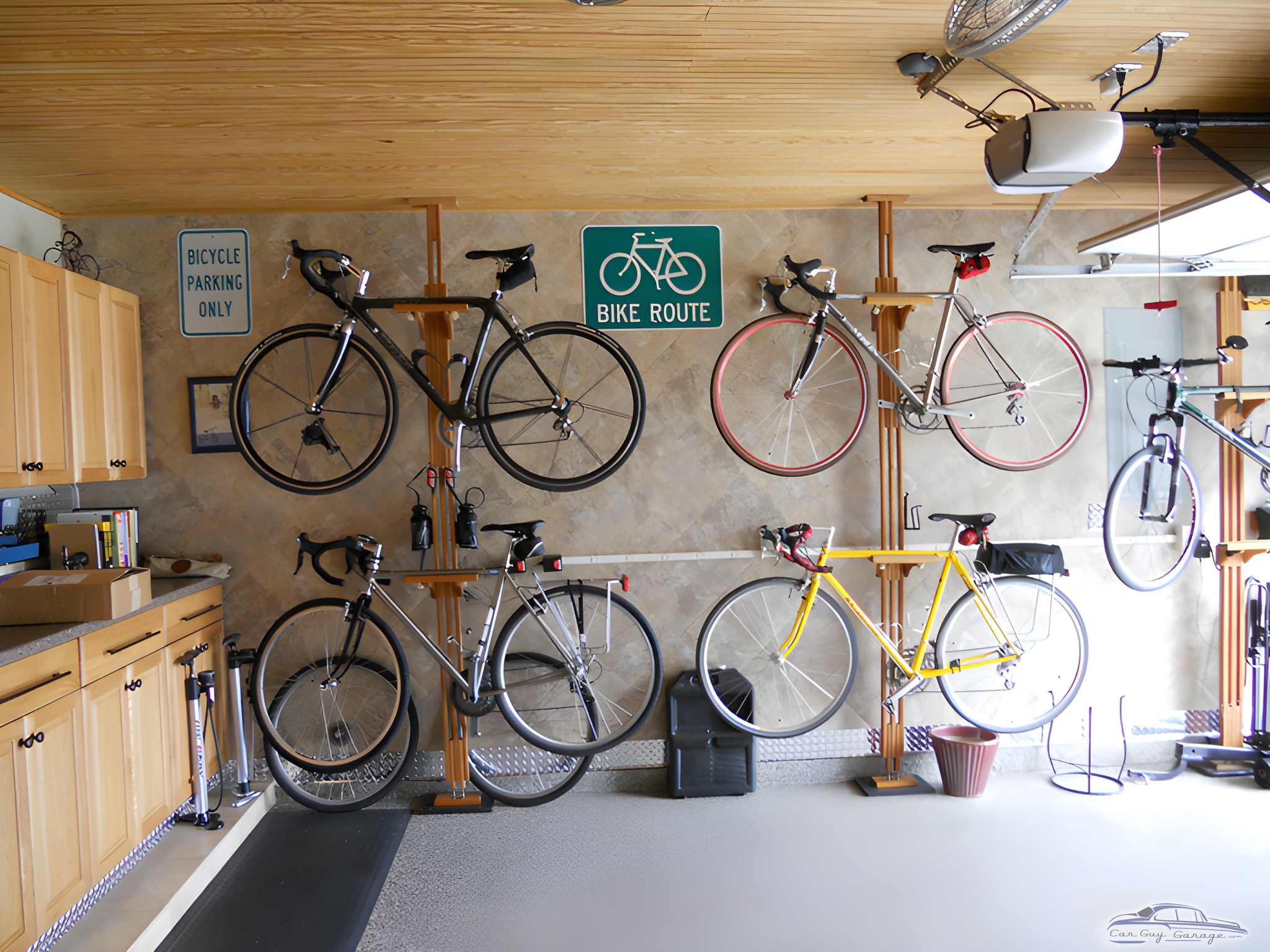 Organized garage with wall bike racks and cabinets - Richard from Spring, TX