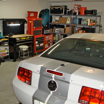 Organized garage with tool chests and Shelby Mustang - Jer from Chicago, IL