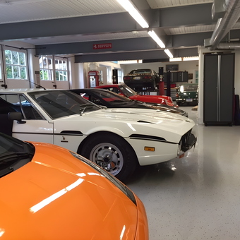 Classic Car Garage with Cabinets and Lift - Trahan Carriage House from Rochester Hills, Michigan