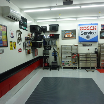 Organized garage with tool chests, wall art, and storage bins - Chris from Fort Mill, SC