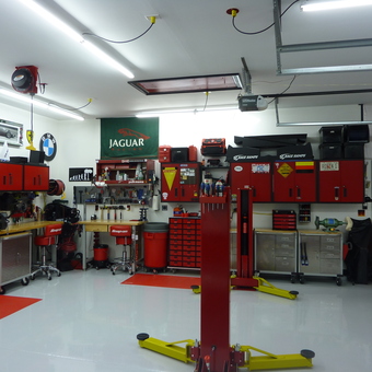 Organized garage with red cabinets and tool chests - Chris from Fort Mill, SC