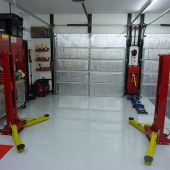 Organized garage with car lift and tool cabinets - Chris from Fort Mill, SC