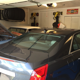 Organized garage with tire rack and classic cars - Dennis from Virginia Beach, VA