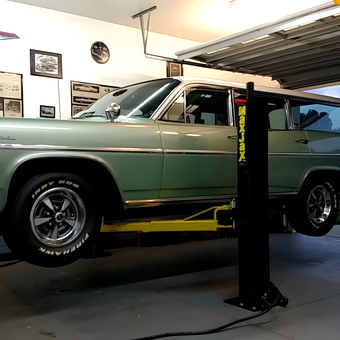 Classic car on MaxJax lift in decorated garage - Ken Nagy from Wake Forest, NC