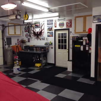Organized Garage with Wall Signs and Tile Flooring - Gary from Poland, Ohio