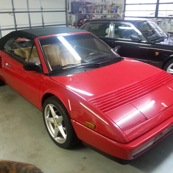 Red Convertible Sports Car and Black Sedan in Garage - Alden from Floral City, FL