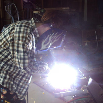 Welding in a Garage with Safety Gear - Millwright from Arkansas city, KS