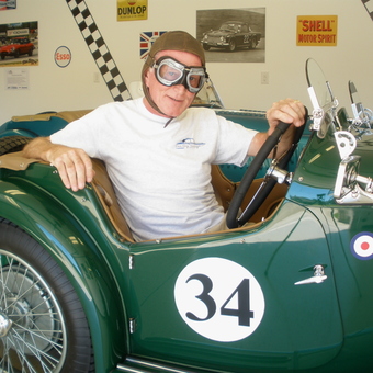 Vintage race car and wall signs in garage - Peter from JONESBOROUGH, TN
