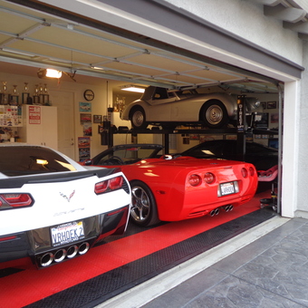Corvette-Themed Garage with Car Lift and Trophies - Johnny Vette from Brentwood, CA