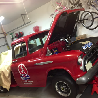 Classic Red Truck on Jack Stands in Organized Garage - Ruby57 from Geneva, IL
