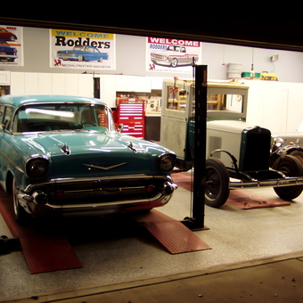 Classic Cars on Lift with Garage Cabinets and Toolbox - Skips from Palatine, Il
