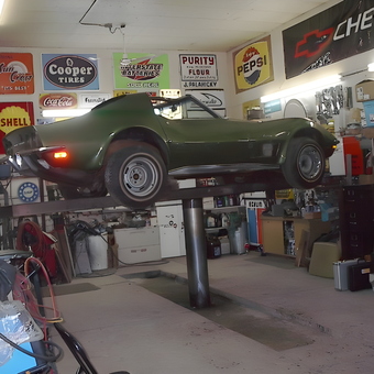 Classic Corvette on Hydraulic Lift in Organized Garage - Johnny Ringo from Hafford, Sask.