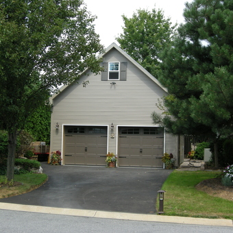 Two Car Garage with Brown Doors and Outdoor Lighting - Cheech from Palmyra, PA