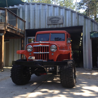 Lifted orange jeep and metal garage exterior - Lon Greenwood from Murphy, NC