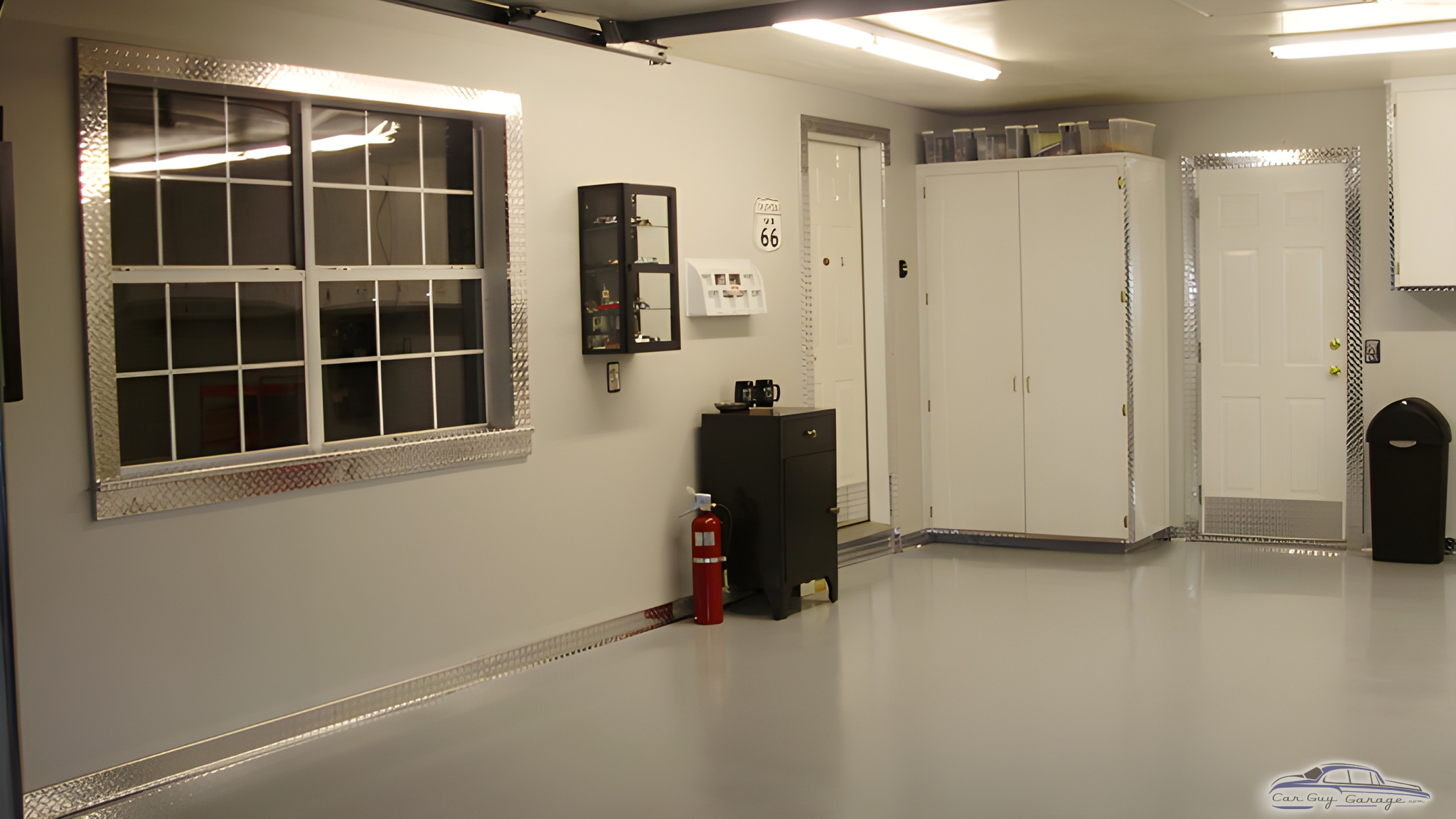 Organized garage with diamond plate trim and cabinets - Doug from Duncan, OK