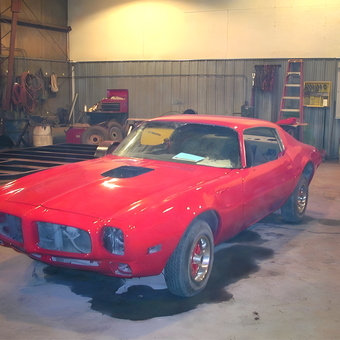Classic Red Muscle Car in Spacious Garage - Rhonda Ravely from Jamestown, North Dakota