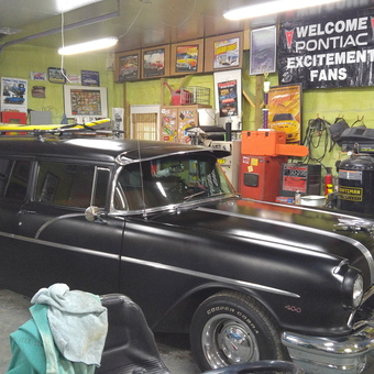 Classic car, tool cabinets, and banners in garage - Woody from Lapeer, Mi.