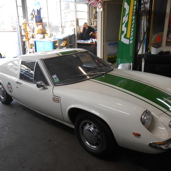 Classic white sports car with green racing stripes - raymond quuillet from villeurbanne, Rhone-Alpes