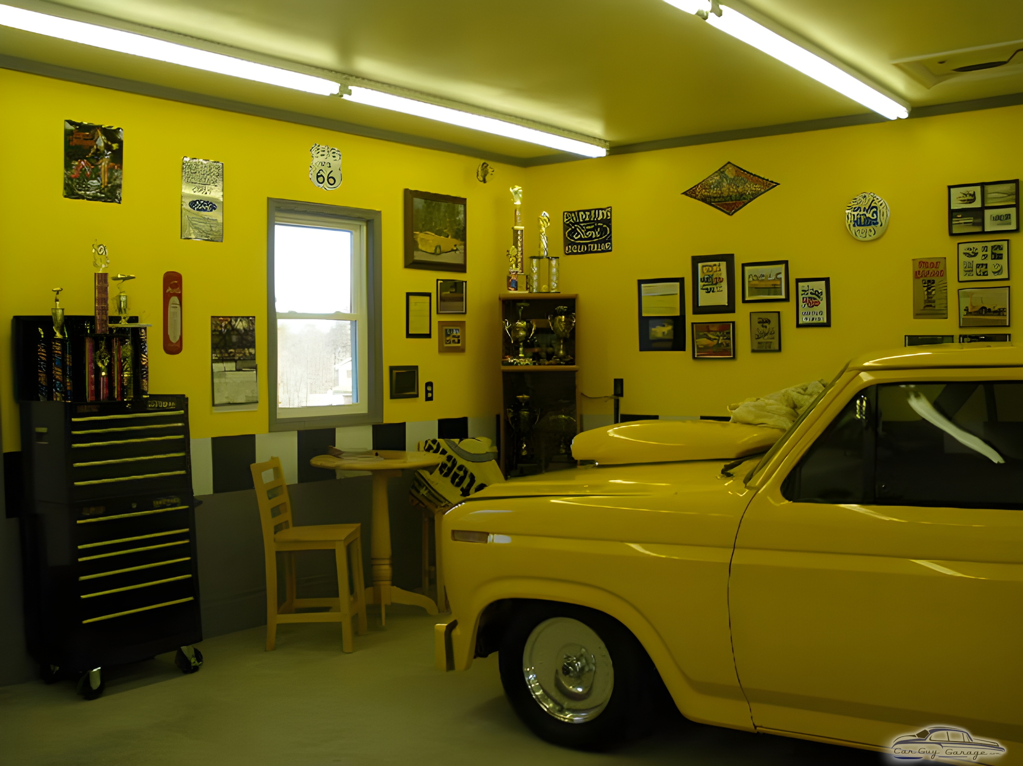 Yellow garage with classic car, tool chest, and trophies - Keith from Brookville, PA