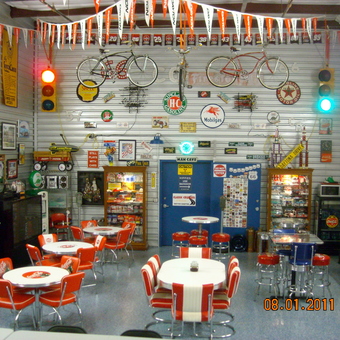 Retro Garage Decor with Vintage Signs and Seating - '57 Fever from Chandler, AZ