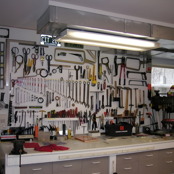 Organized Garage Wall with Tools and Workbench - Burt from Chicago, Illinois