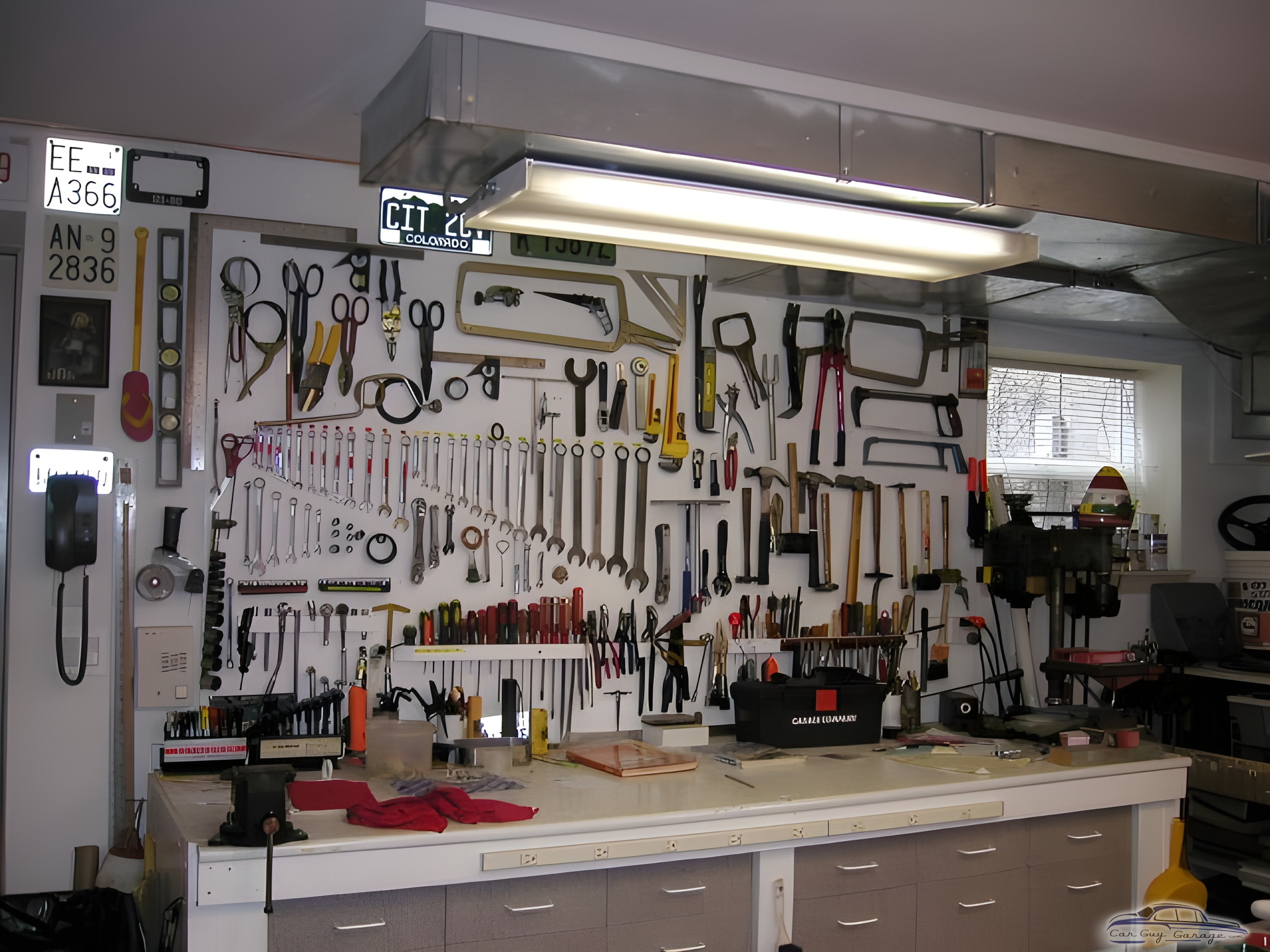 Organized Garage Wall with Tools and Workbench - Burt from Chicago, Illinois