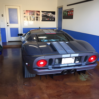 Custom garage with sports car, posters, and blue trim - Andy from Ewa Beach, HI