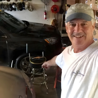 Organized garage with car, bar stool, and wall storage - Dave from Huntington Beach, Ca