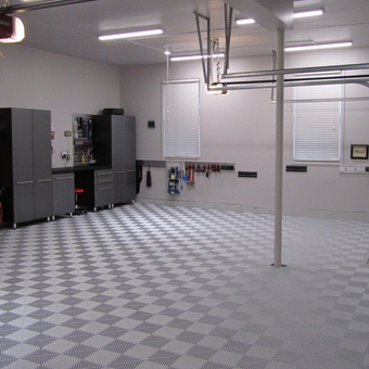 Organized Garage with Cabinets and Tile Flooring - Stunning Detail from Sycamore, IL