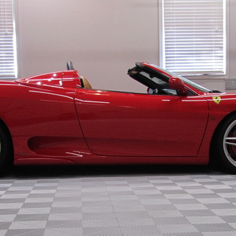 Luxury Garage with Red Sports Car and Cabinets - Stunning Detail from Sycamore, IL