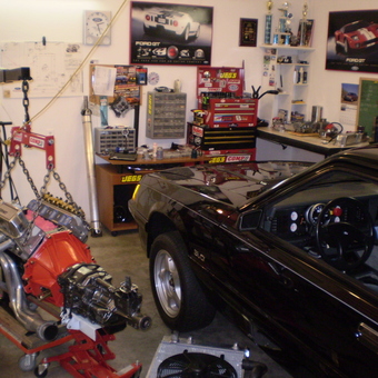 Organized garage with engine hoist, tool chests, car - toslo50 from HANOVER, PA