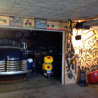 Classic Truck, Yellow Scooter, and Tool Wall Garage - AL from Hartford, S.dak.