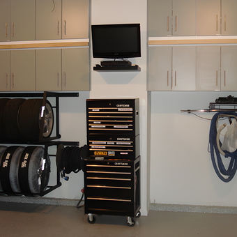 Organized garage with tire rack, tool chest, and cabinets - Scott from Lees Summit, MO