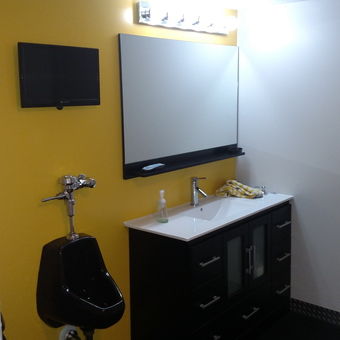 Garage bathroom with black vanity and urinal - SETH from MUSCATINE, IOWA