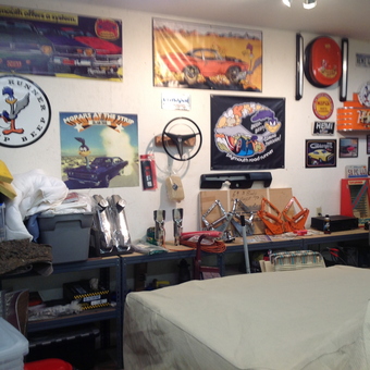 Mopar themed garage with car parts and wall art - Mopar Don from Riveron, Illinois