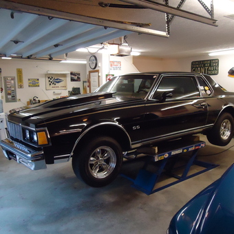 Classic Black SS Car on Lift in Decorated Garage - Cutlass Dan from Hurricane, WV