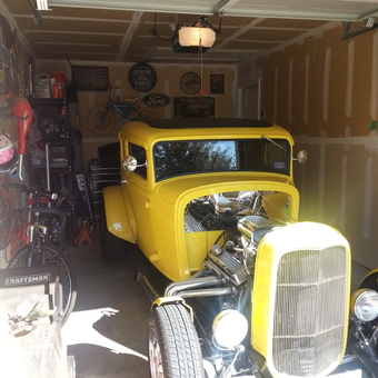 Classic Yellow Hot Rod and Ford Signs in Garage - John from Fort Worth, TX