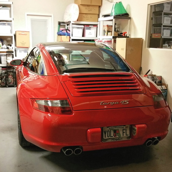 Organized garage with red Porsche Targa 4S - Bob R from Naples, Florida