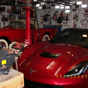 Classic and Modern Red Corvettes in Decorated Garage - Lew from Saint Johns, Florida