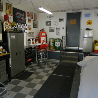 Classic Car Garage with Retro Decor and Storage - ss-john
