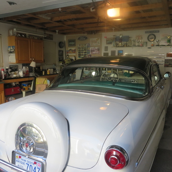 Classic Car Garage With Trophies and Cabinets - Bill