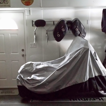 Garage with Motorcycle Cover, Wall Rack, and Golf Bags - Kevin Conable from Tonawanda, New York