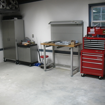 Organized garage with tool storage and workbench - King William, VA
