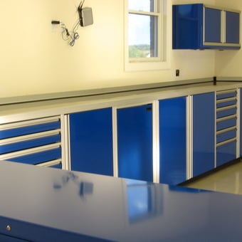 Modern Garage with Blue Metal Cabinets and Tool Drawers - Anonymous