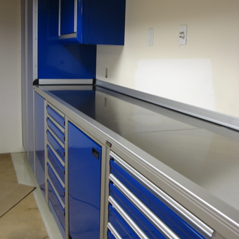 Modern Blue Garage Cabinets with Stainless Steel Countertop - Anonymous