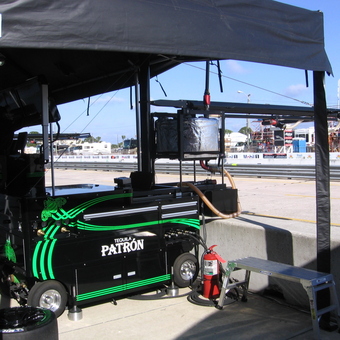 Race Day Garage Pit Setup with Tool Cart and Canopy - Anonymous
