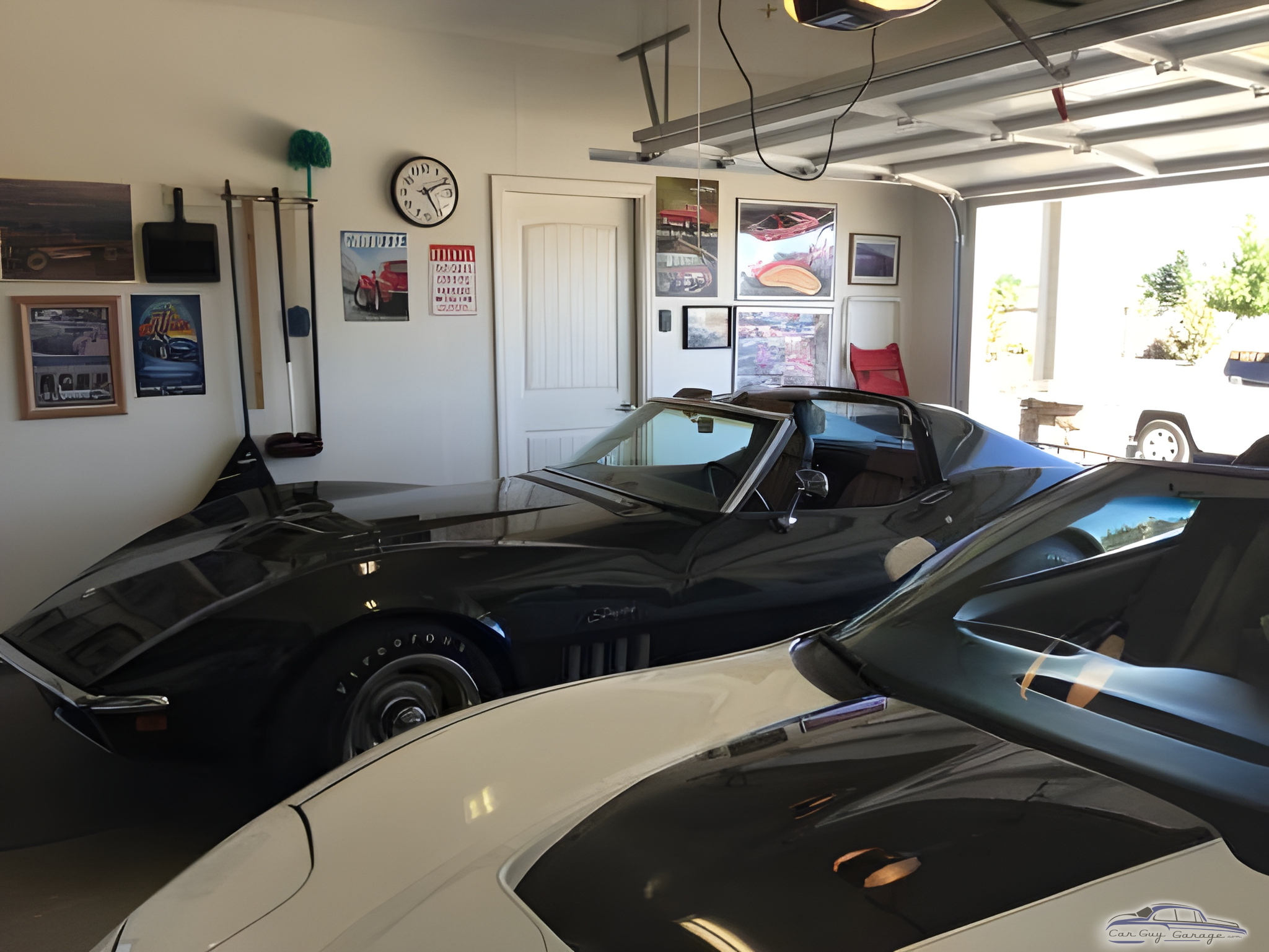 Classic Cars in Organized Garage with Wall Art - Robert from Chico, Ca.