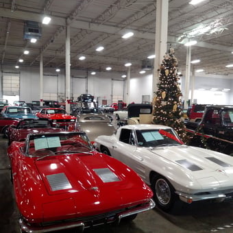Classic Corvette Display in Holiday Garage - Streetside Classics from Charlotte, NC