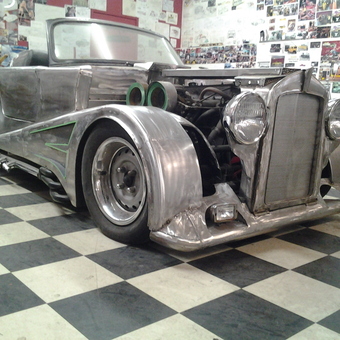 Custom metal hot rod build in garage with checkered floor - CurtisCustoms.com from Elmsdale, Nova Scotia